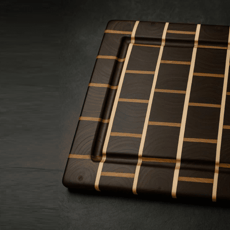 Jeu-concours : Remportez une planche artisanale en noyer massif et chêne.