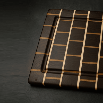 Jeu-concours : Remportez une planche artisanale en noyer massif et chêne.